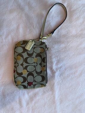 Coach Brown Tan Wristlet with Gold and Red Accents